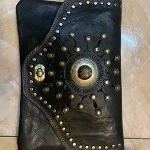 Authentic leather clutch with stone details